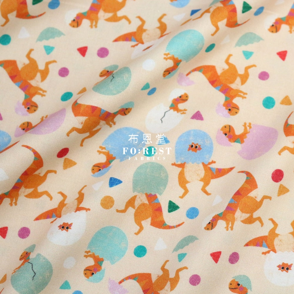 Cotton - Rainbow Hatching Dinosaur Fabric Peach