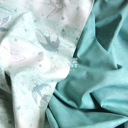 cotton - Swallow in the snow Metallic fabric (green) - forest-fabric