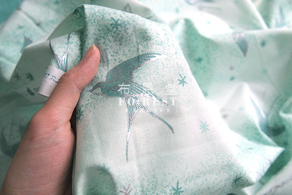 cotton - Swallow in the snow Metallic fabric (green) - forest-fabric