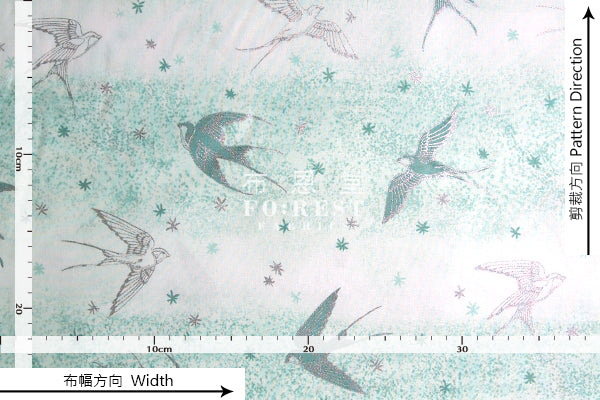 cotton - Swallow in the snow Metallic fabric (green) - forest-fabric